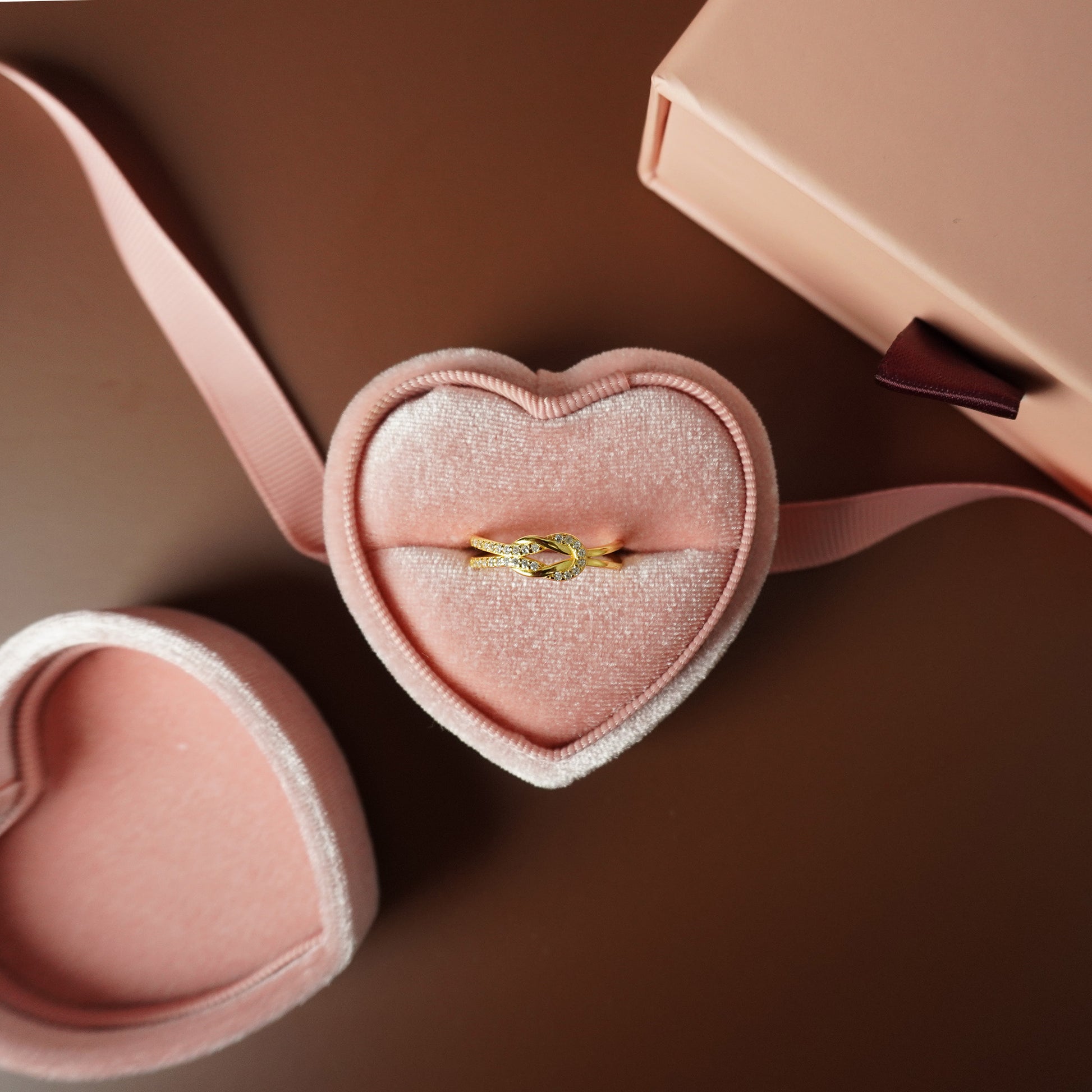 To My Grand Daughter - Bound by Love Hand Knot Ring With Zirconia Stones