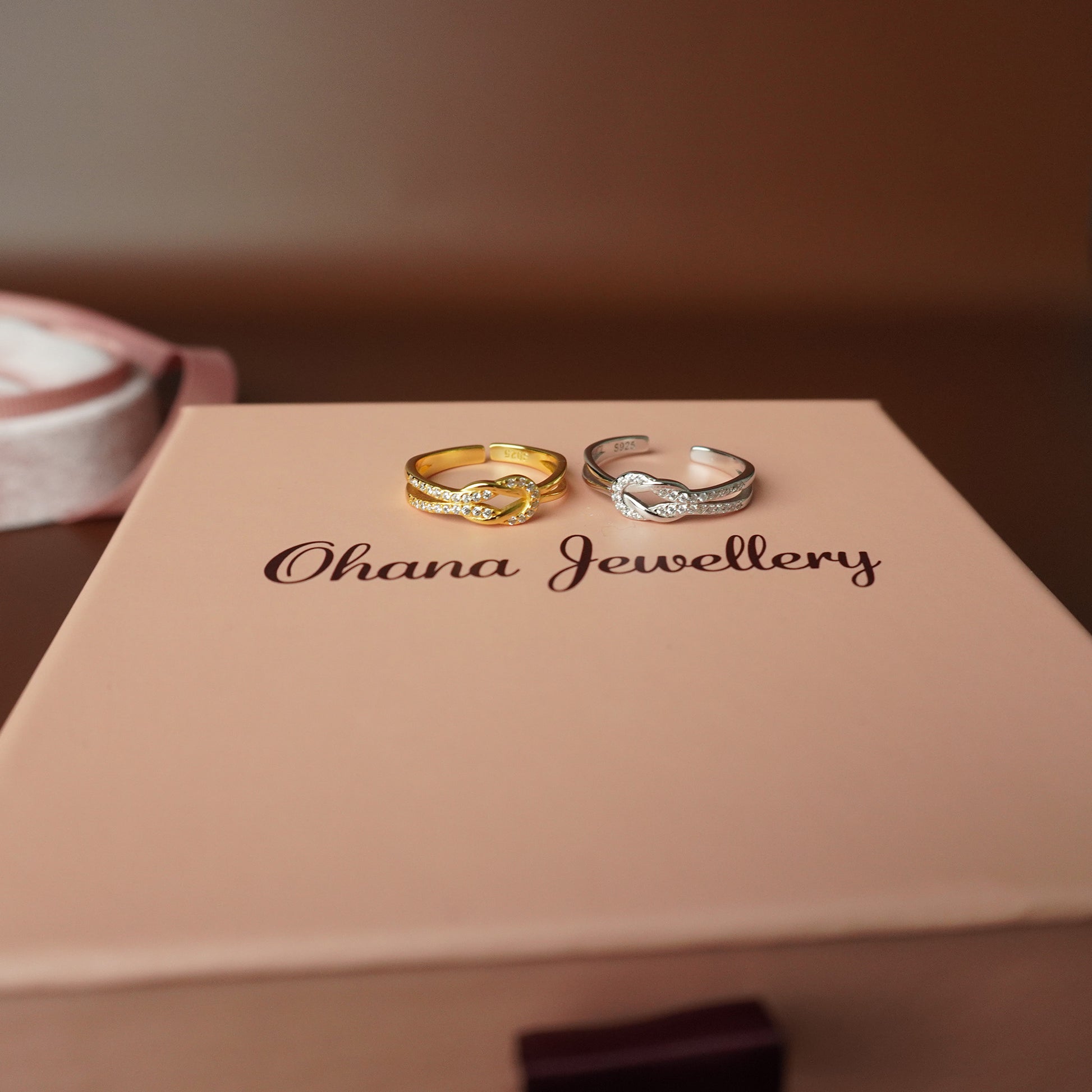 To My Grand Daughter - Bound by Love Hand Knot Ring With Zirconia Stones
